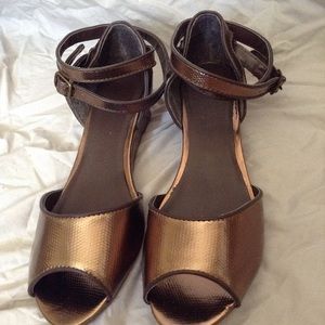 Bronze strap sandal.